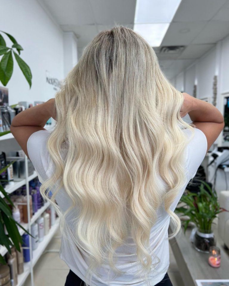 Healthy, glossy blonde hair extensions cared for at home, Donya Hair + Body, Richmond Hill