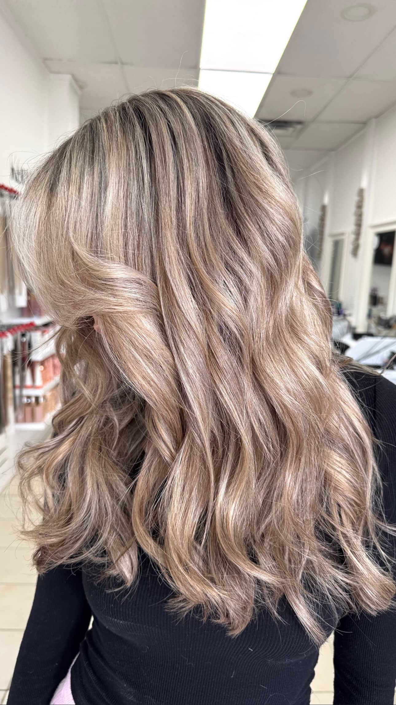 Gold beige blonde balayage with face-framing money piece on layered hair in Richmond Hill